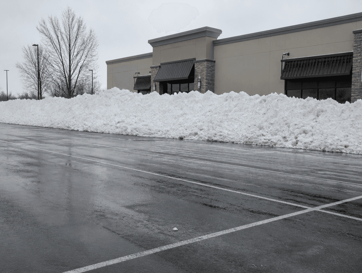 Snow pile pushed to lot edge